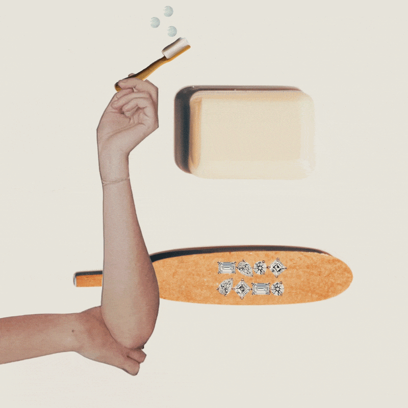 A soft brush, mild soap